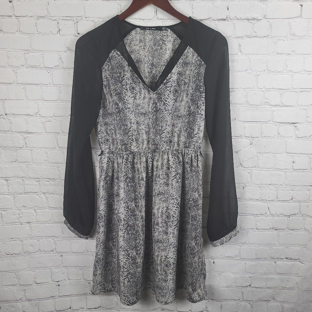 Doe & Rae Dress. Snake Print Black Accents…